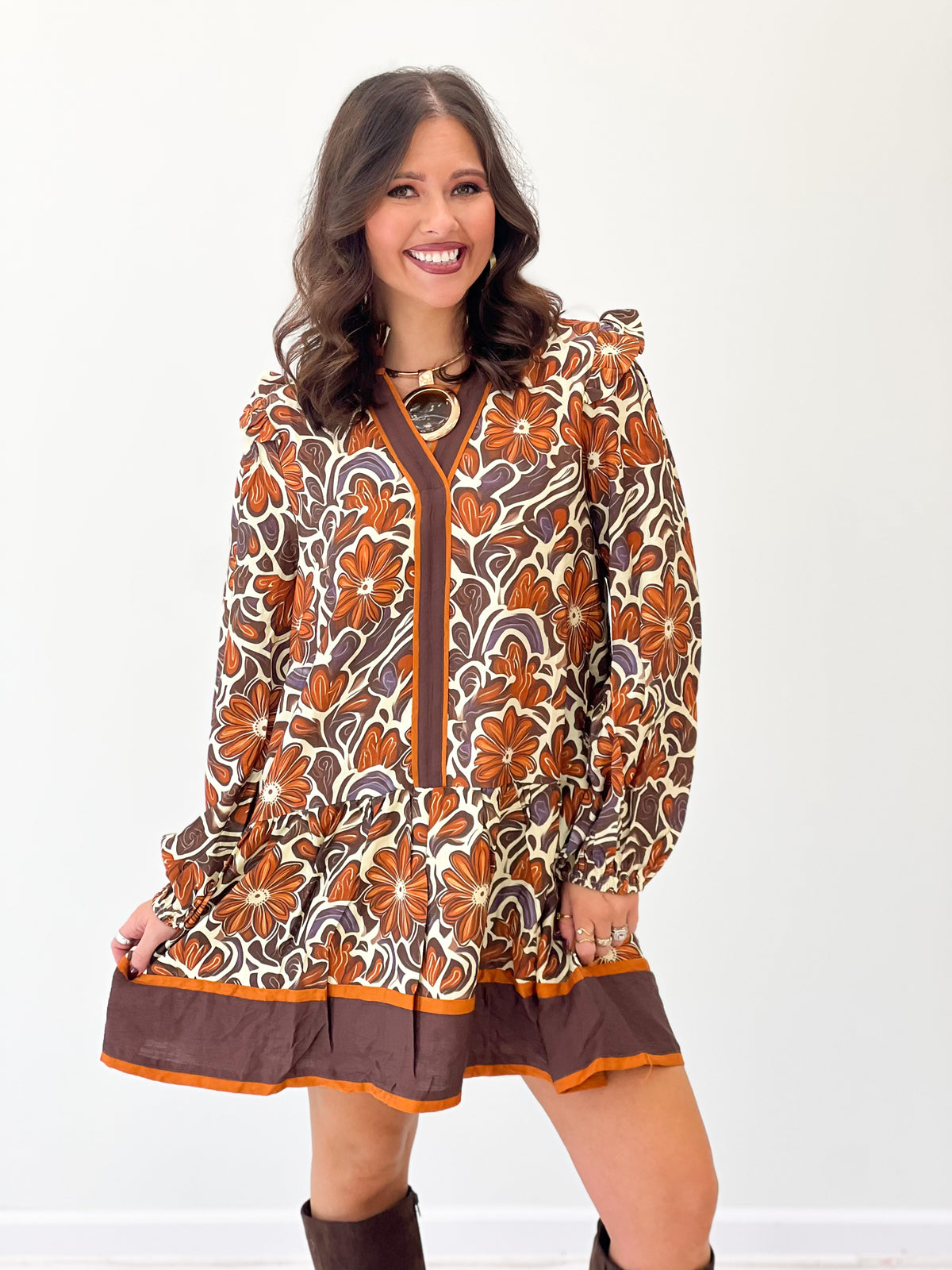 Brown floral V-neck ruffle dress with long puff sleeves and button-front placket