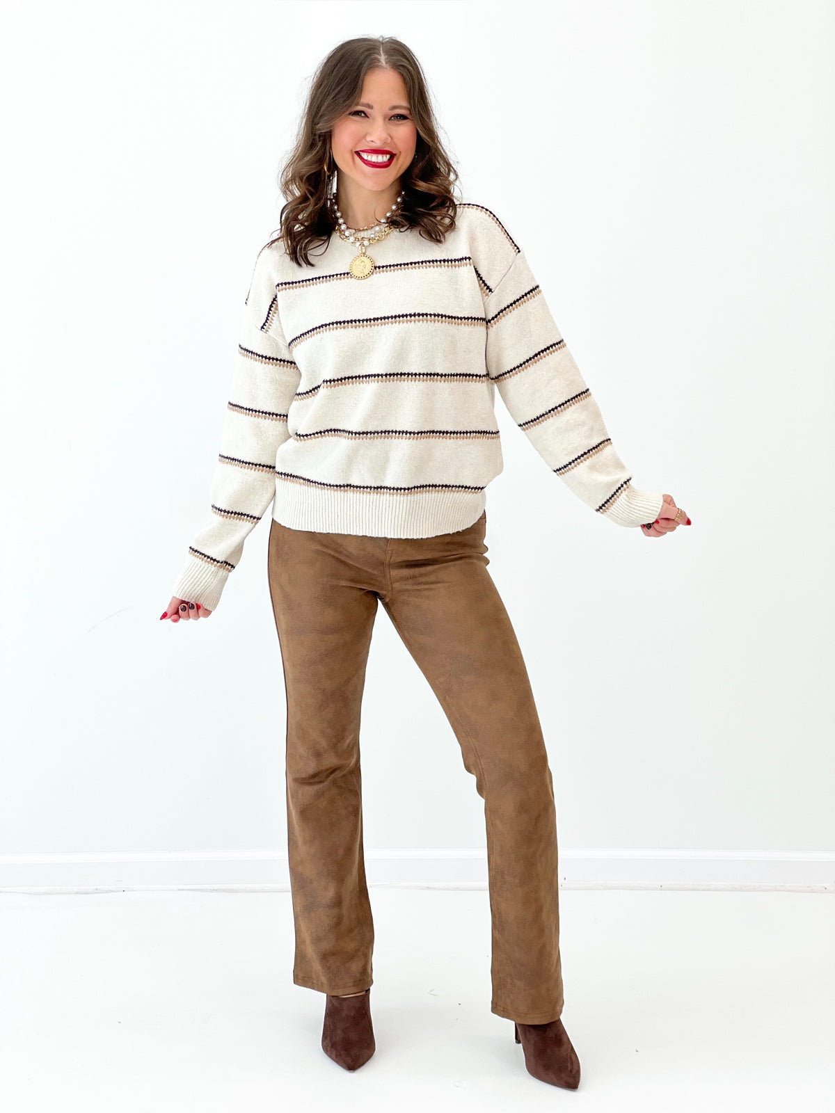 Oatmeal knit stripe pullover with crew neck and long sleeves, ribbed waist