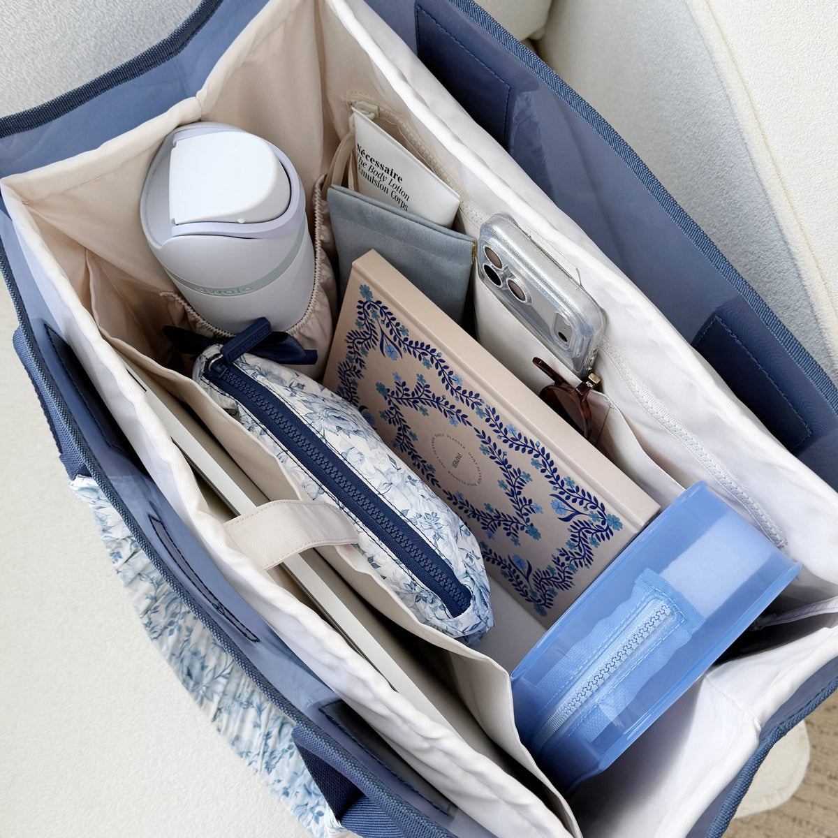 Cream tote organizer insert with multiple vertical compartments and side pockets