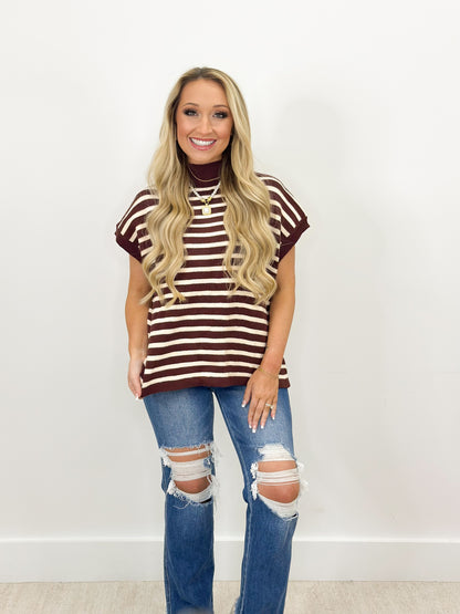 Burgundy and white striped mock neck sweater with short sleeves and ribbed collar