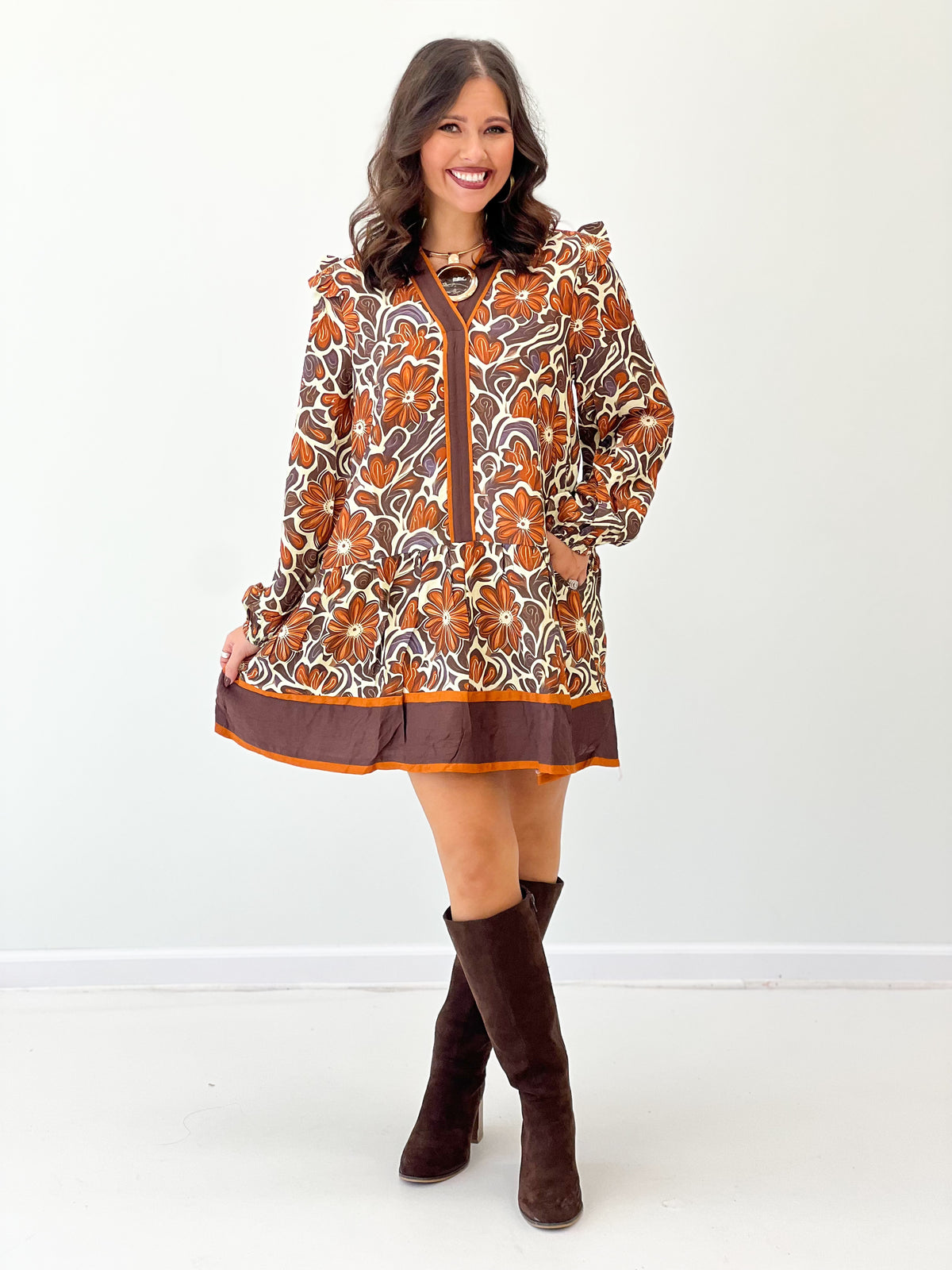 Brown floral V-neck ruffle dress with long puff sleeves and straight button placket