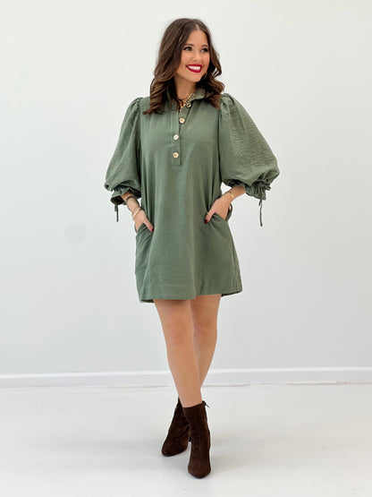 Olive button-front mini dress with ruched shoulders and gathered puff sleeves