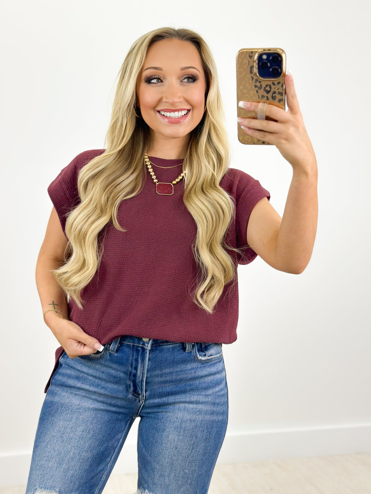 Tres Bien Round Neck Sleeveless Knit Top