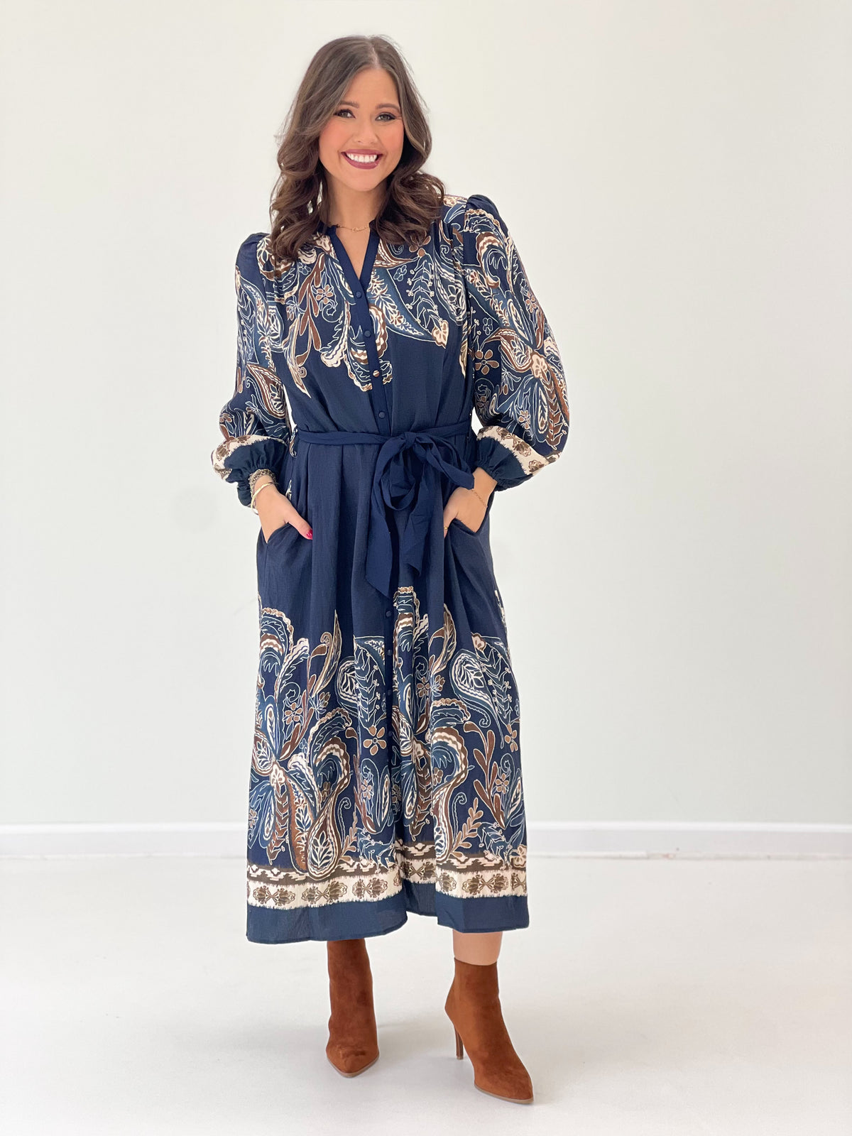 Navy abstract print long-sleeve maxi dress with V-neck buttons and tie sash waist