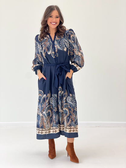 Navy abstract print long-sleeve maxi dress with V-neck buttons and tie sash waist