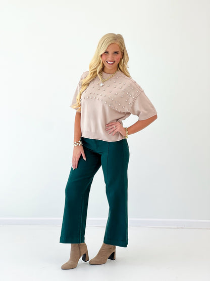 Hunter green high-rise crop wide-leg pants, full-body front angle, tailored waistband