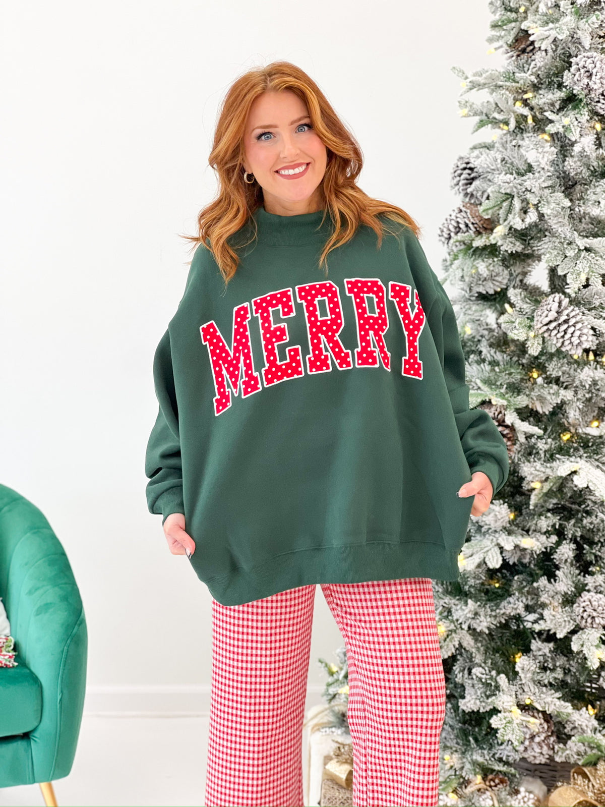 Green mock neck Christmas sweatshirt with polka dot MERRY applique