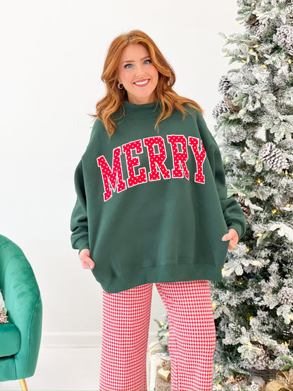 Green mock neck Christmas sweatshirt with polka dot MERRY applique