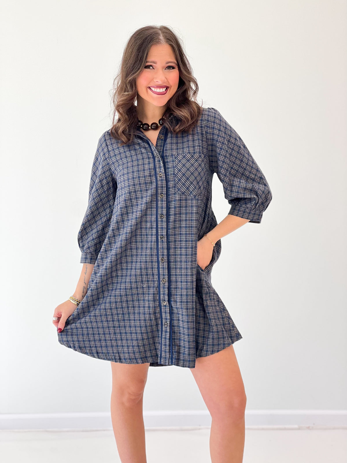 Blue plaid long-sleeve button-down shirt dress with collar and front buttons