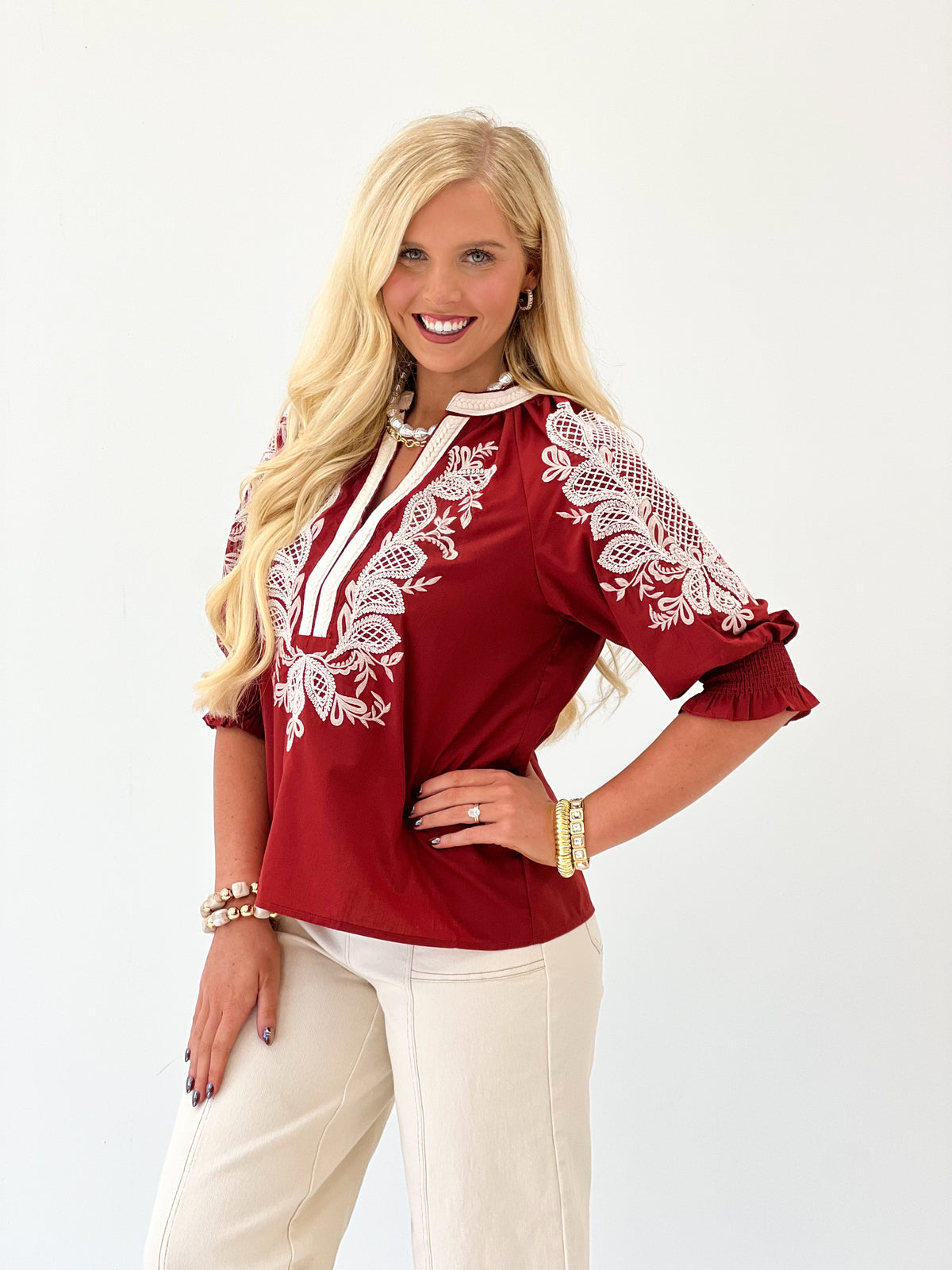 Entro dark red embroidered V-neck blouse with white floral eyelet detailing