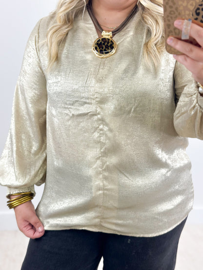 Shimmer gold V-neck top with shirred sleeve cuffs