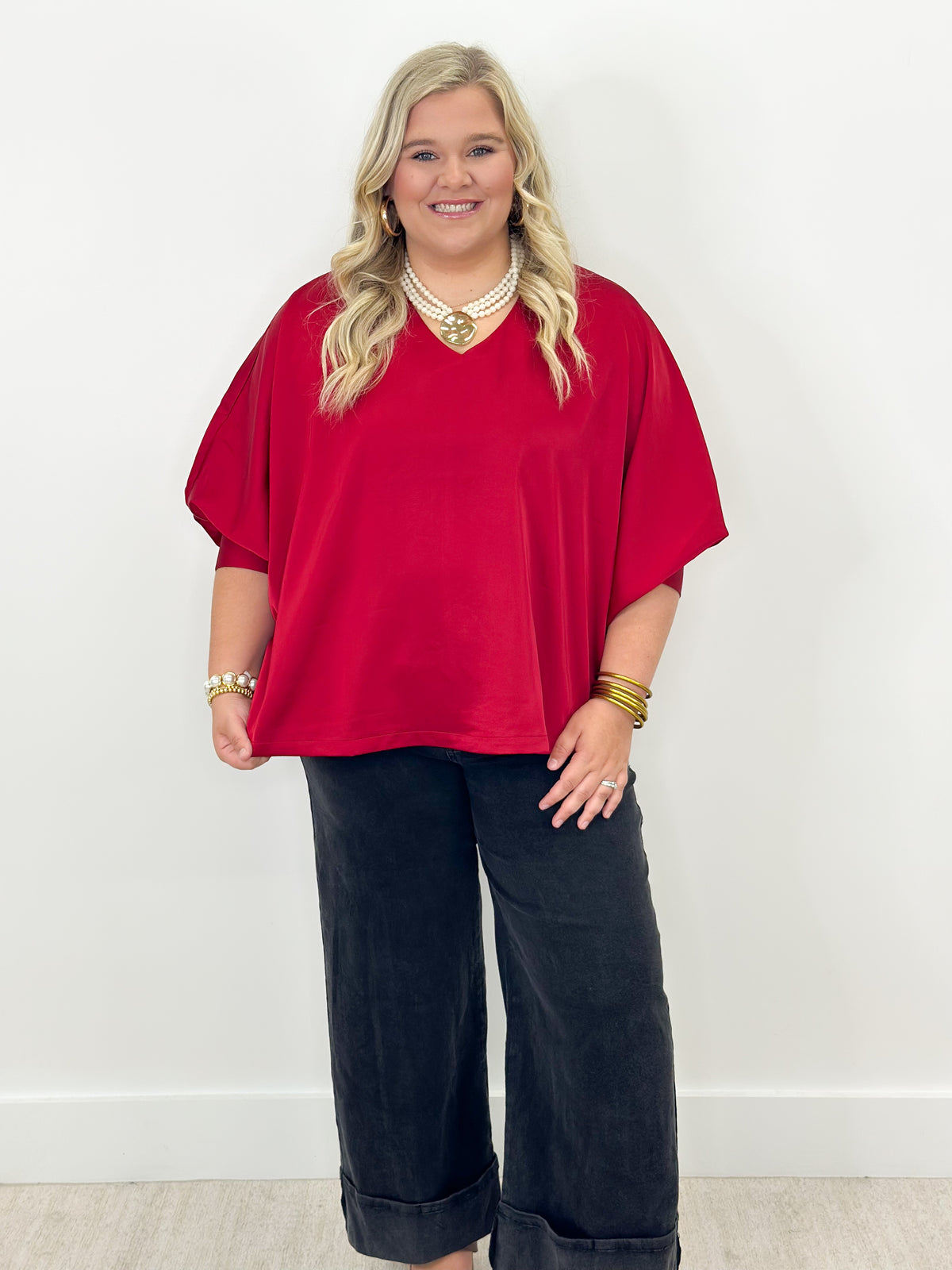 Ruby oversized v-neck top with cuffed batwing sleeves and relaxed fit