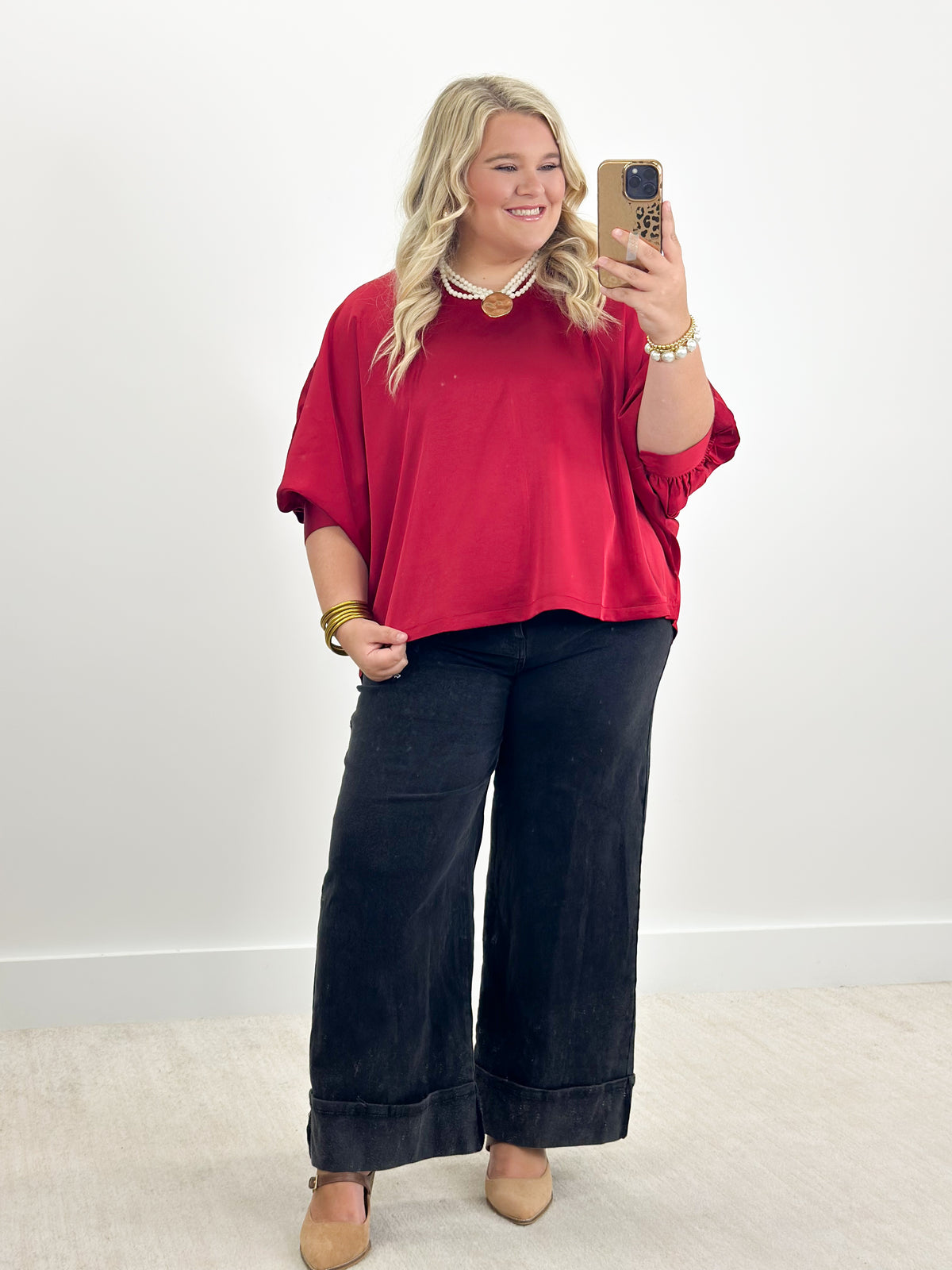 Ruby oversized v-neck top with cuffed batwing sleeves, elbow-length hem