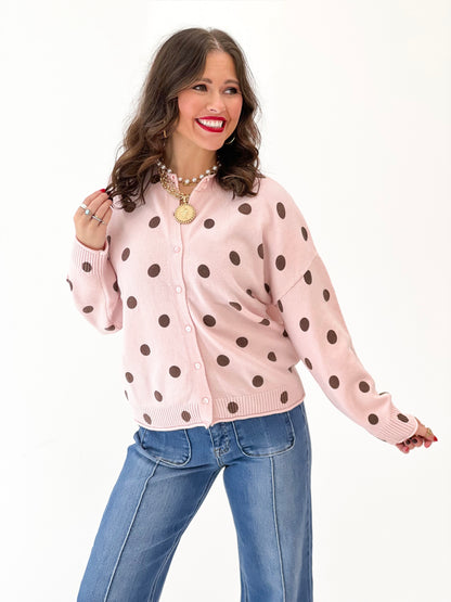 Polka dot knit cardigan, pink button-front top with long sleeves