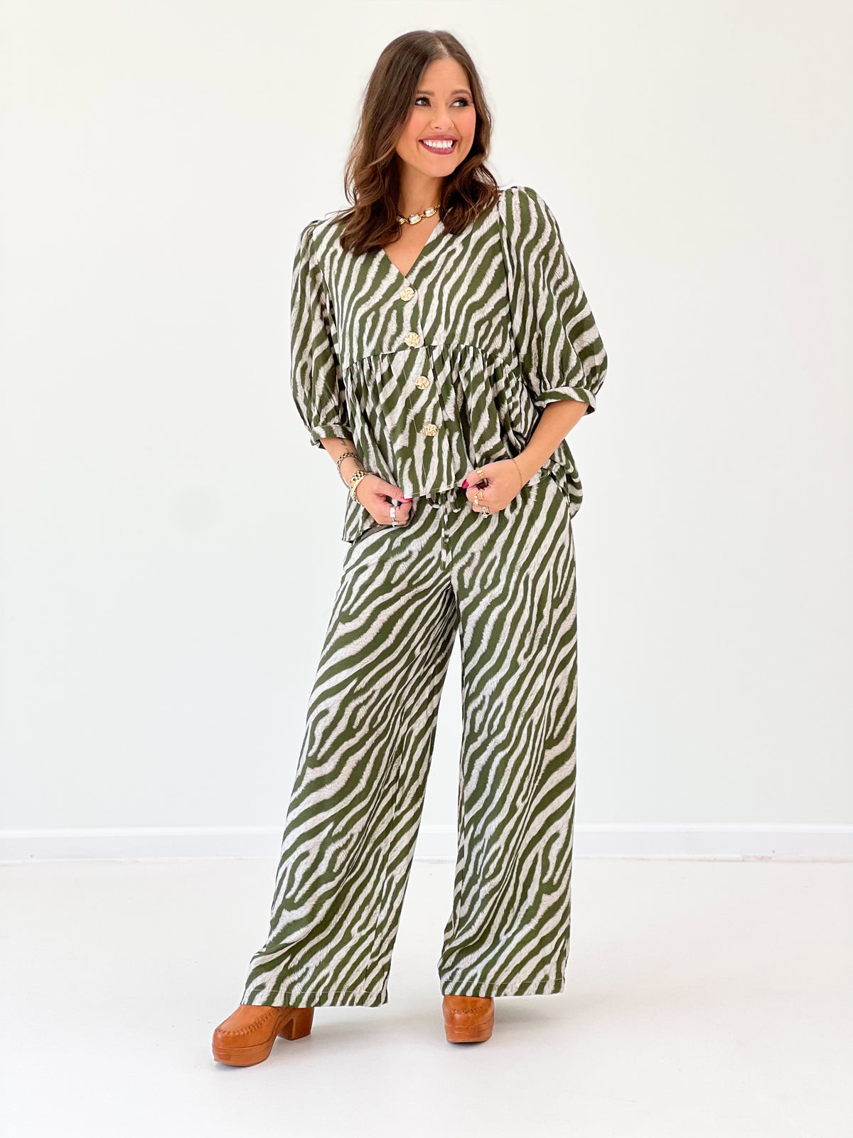 Olive zebra-print wide-leg drawstring pants with front pockets