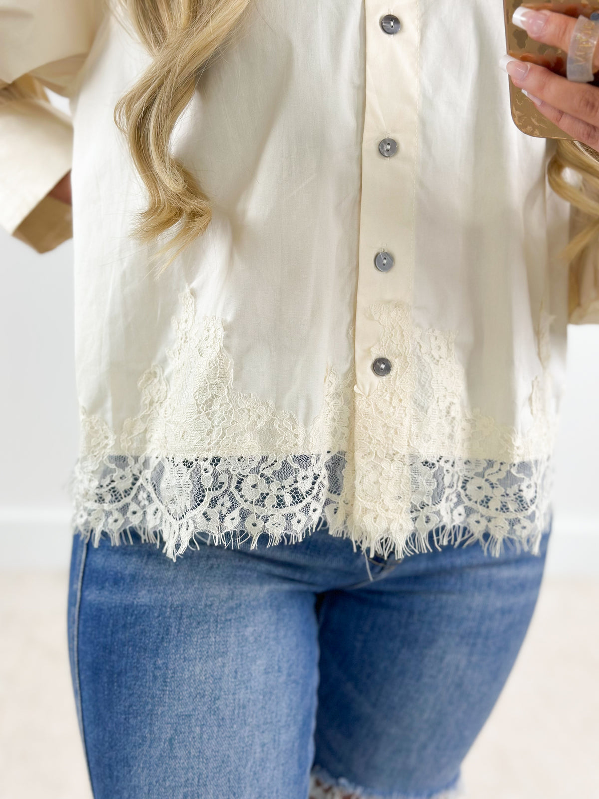 Ecru lace-trim puff sleeve button-down top with front buttons and scalloped hem