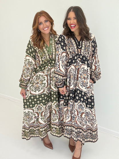 Abstract print midi dress with contrast trim, long sleeves, V-neck, and pockets