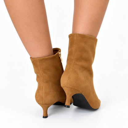 Camel suede ankle boots with side zipper, low heel and pointed toe, back view