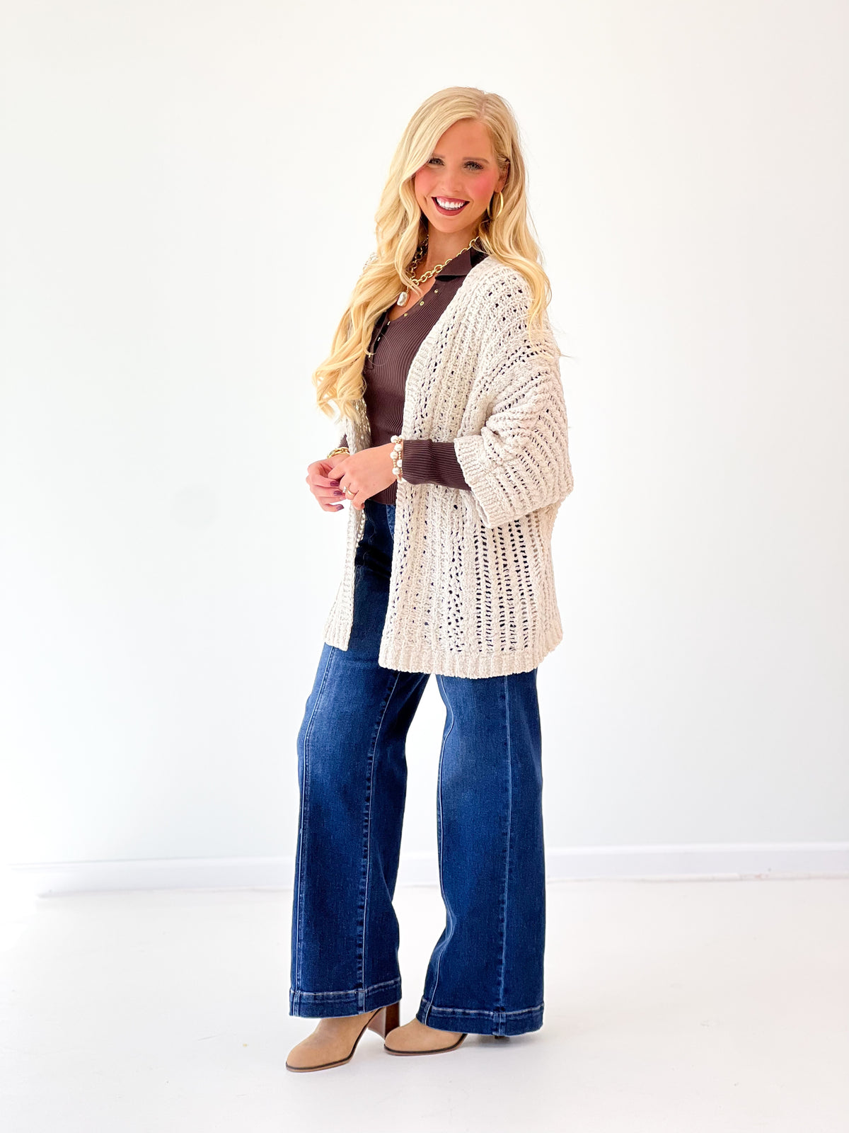 Oatmeal open-knit cardigan sweater with long sleeves and textured open front
