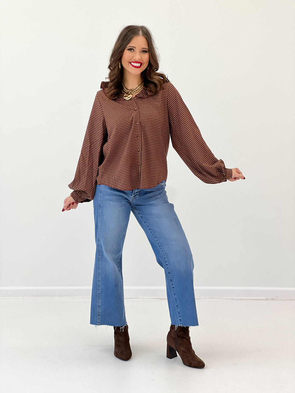 Burgundy multi plaid blouse with ruffle collar and long sleeves