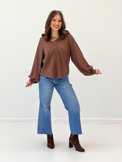 Burgundy multi plaid blouse with ruffle collar and long sleeves