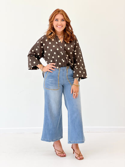 Espresso polka dot button-down top with button front and relaxed long sleeves