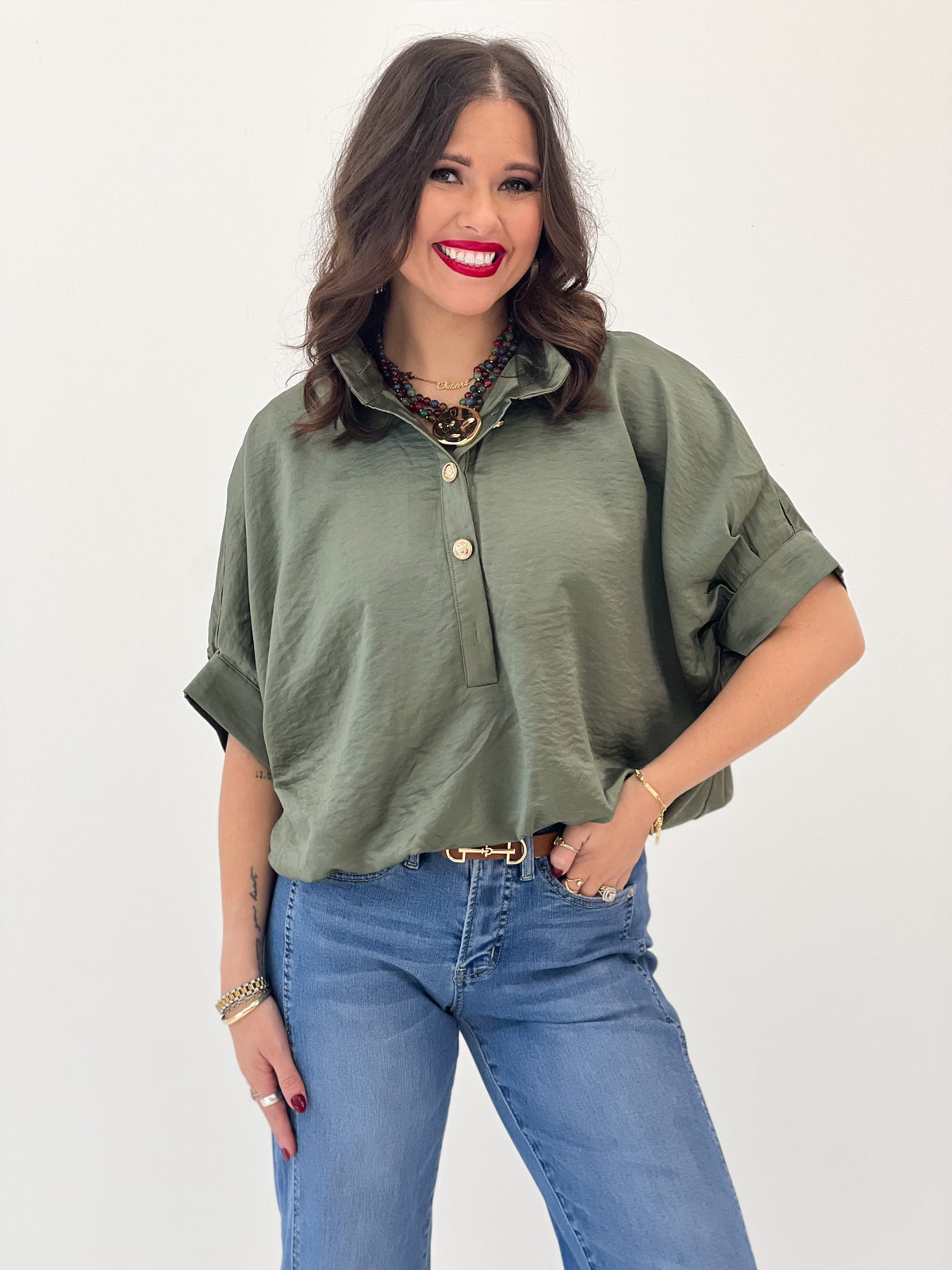 Olive stand-collar button-up short-sleeve blouse with front placket and cuffed sleeves
