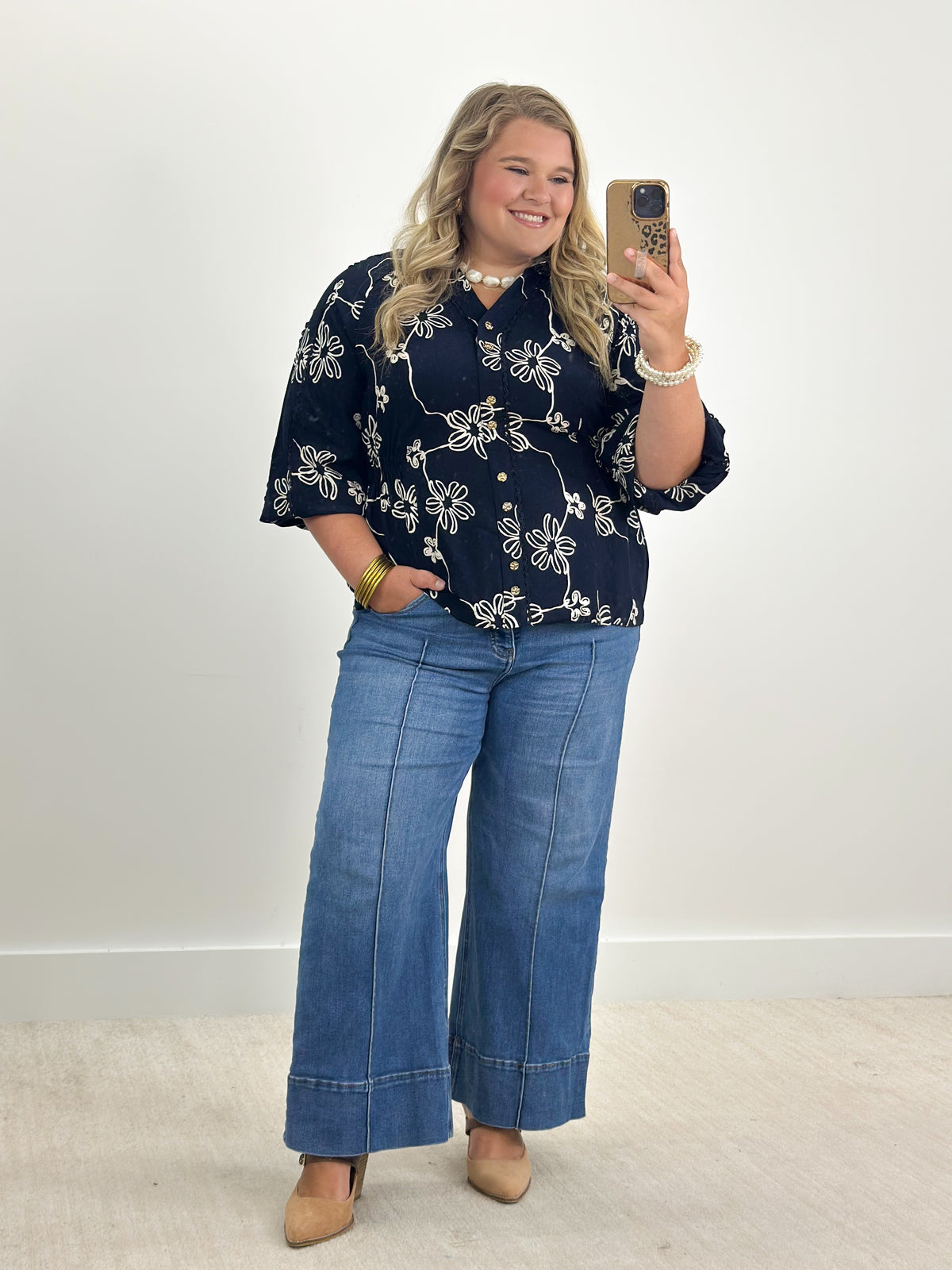 Navy floral printed button-detail top with loose fit and half sleeves