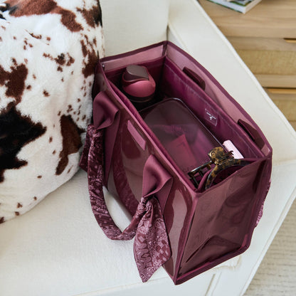 Burgundy tote organizer with fabric handles, open top, and internal pockets for bottles