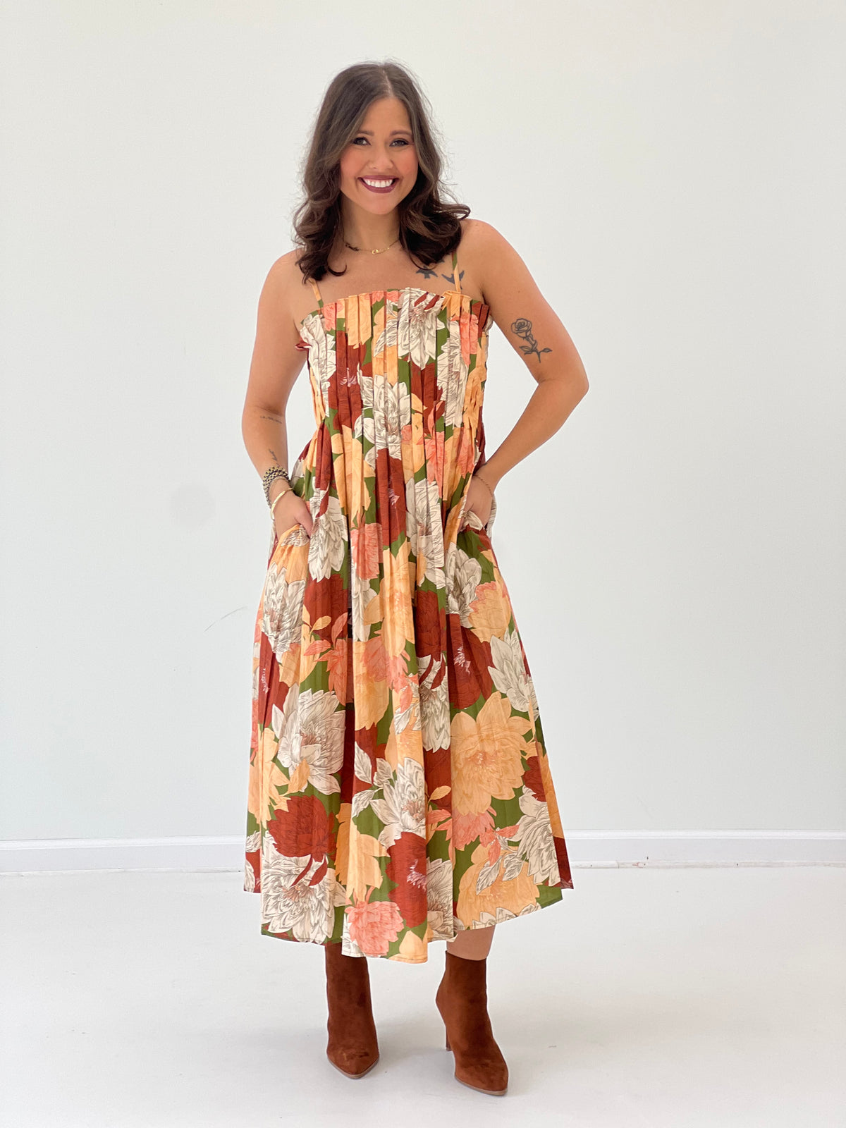Floral sleeveless midi dress with pleated bodice and full skirt, multicolor botanical print