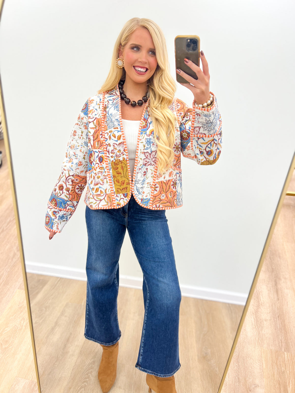 Quilted kimono-style jacket in multicolor print with open front and long sleeves