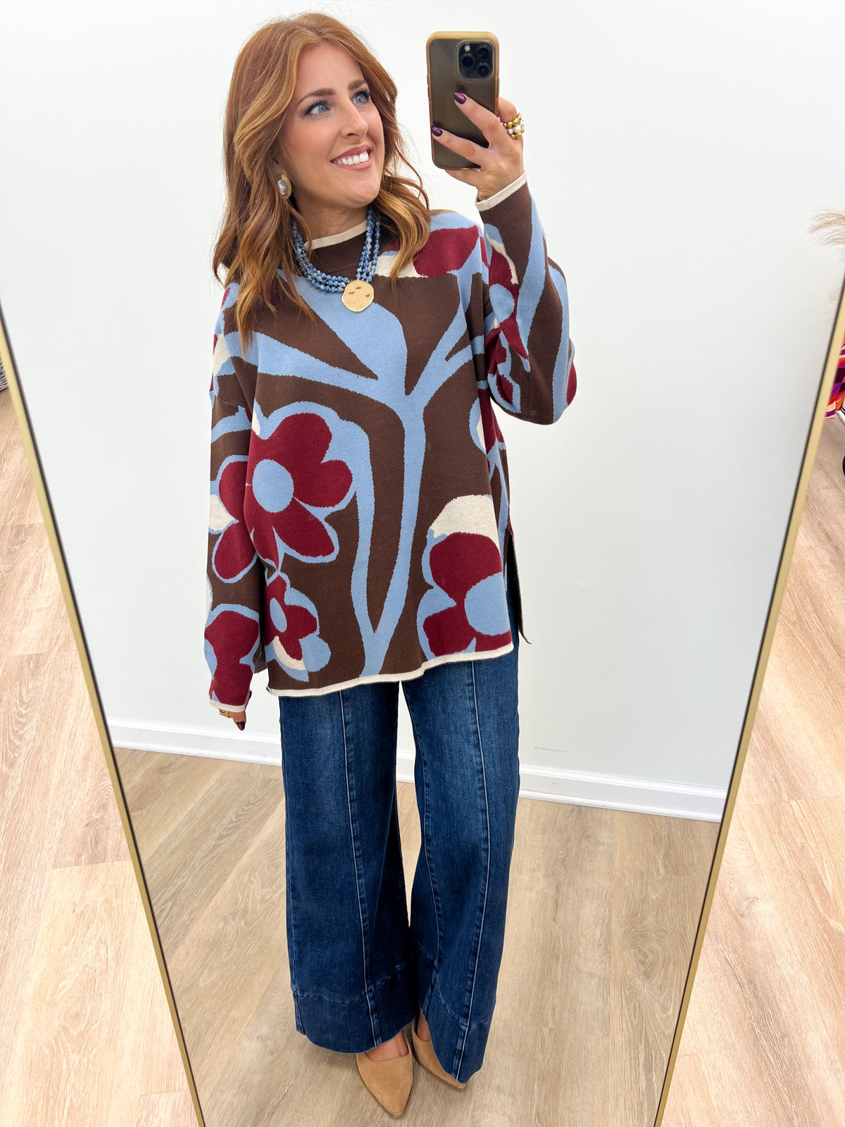 Floral print crewneck sweater top with bold abstract flowers, long sleeves, relaxed fit