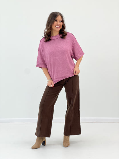 Pink metallic lurex knit sweater with mock neck and ribbed hem, short sleeves