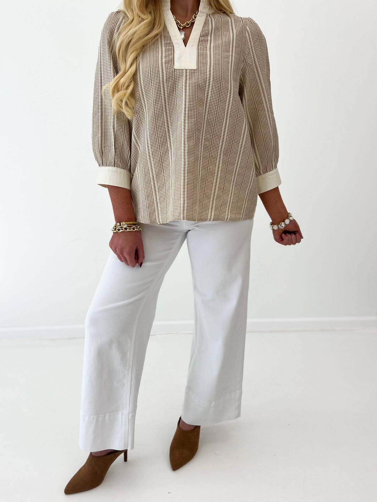 Taupe striped ruffle-collar blouse with split neckline and three-quarter sleeves