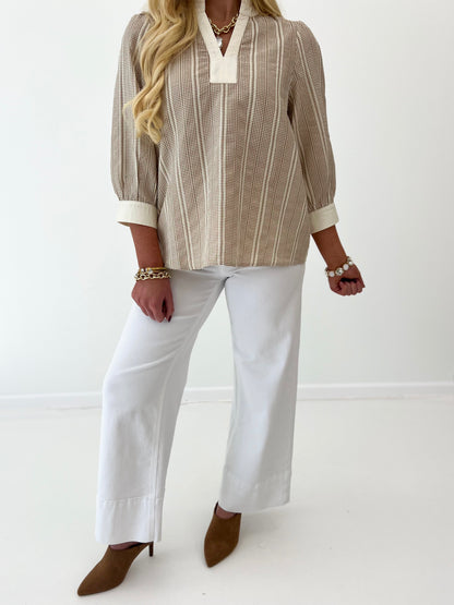 Taupe striped ruffle-collar blouse with split neckline and three-quarter sleeves