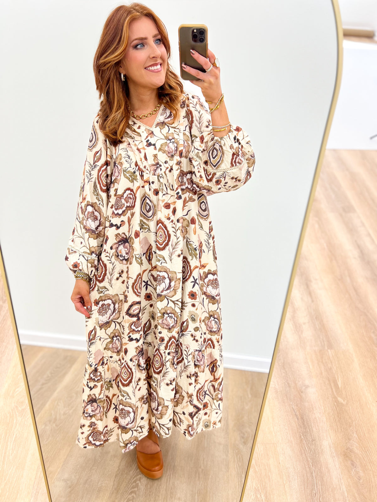 Ecru floral print maxi dress with puff sleeves, long tiered skirt hem