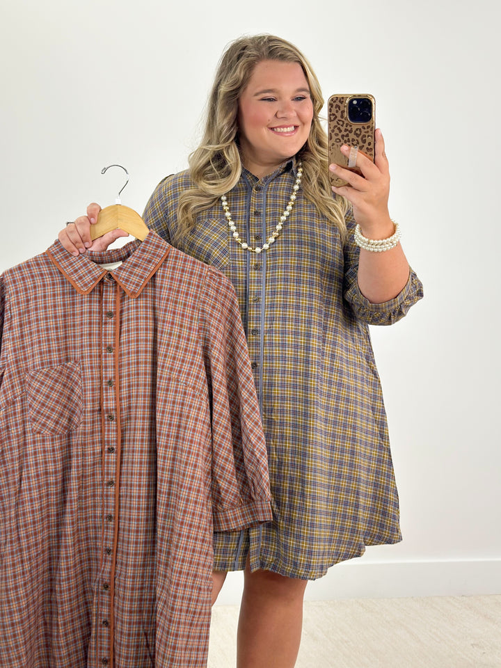Plaid button-down long-sleeve dresses in blue and rust, front button placket, midi length