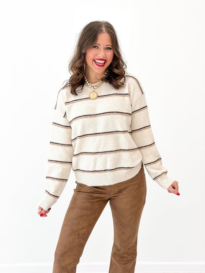 Oatmeal knit striped sweater pullover with crew neck and ribbed cuffs
