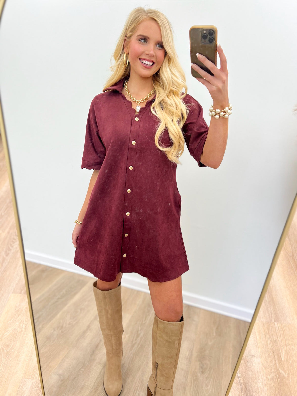 Burgundy suede button-down mini dress with scalloped neckline and short sleeves