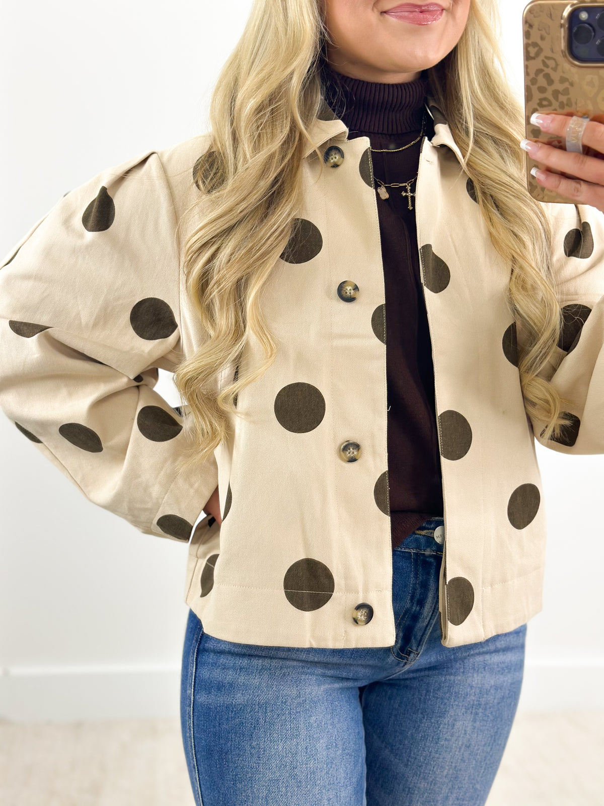 Beige polka dot button-front jacket with collar and long sleeves