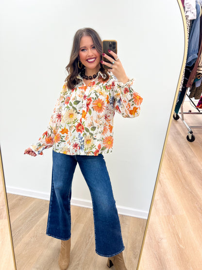 Floral print long-sleeve blouse with lace-trimmed neckline and button front, off-white multicolor