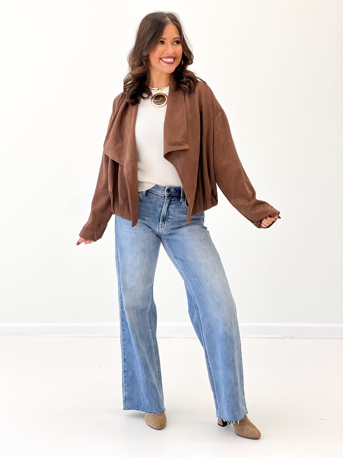 Brown suede collared jacket draped open front with patch pockets