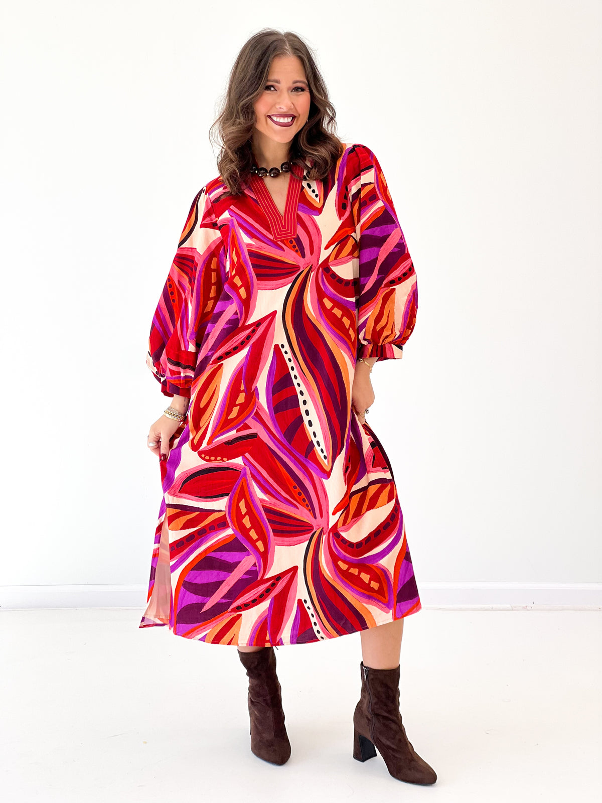 Red boho midi dress, V-neck and long puff sleeves, abstract pattern skirt