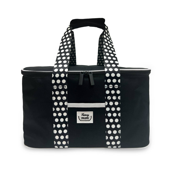 Black insulated travel tote with polka-dot handles and front drawstring pocket