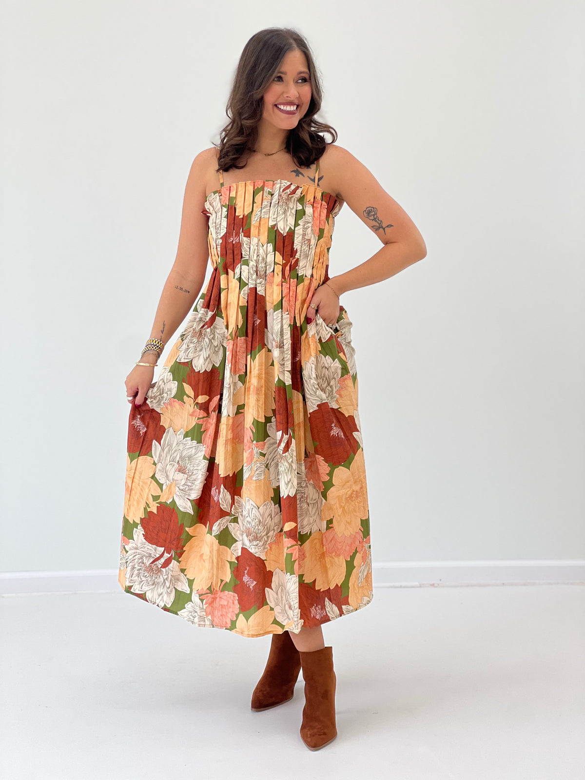 Floral sleeveless midi dress with pleated detail and multicolor garden print, A-line skirt