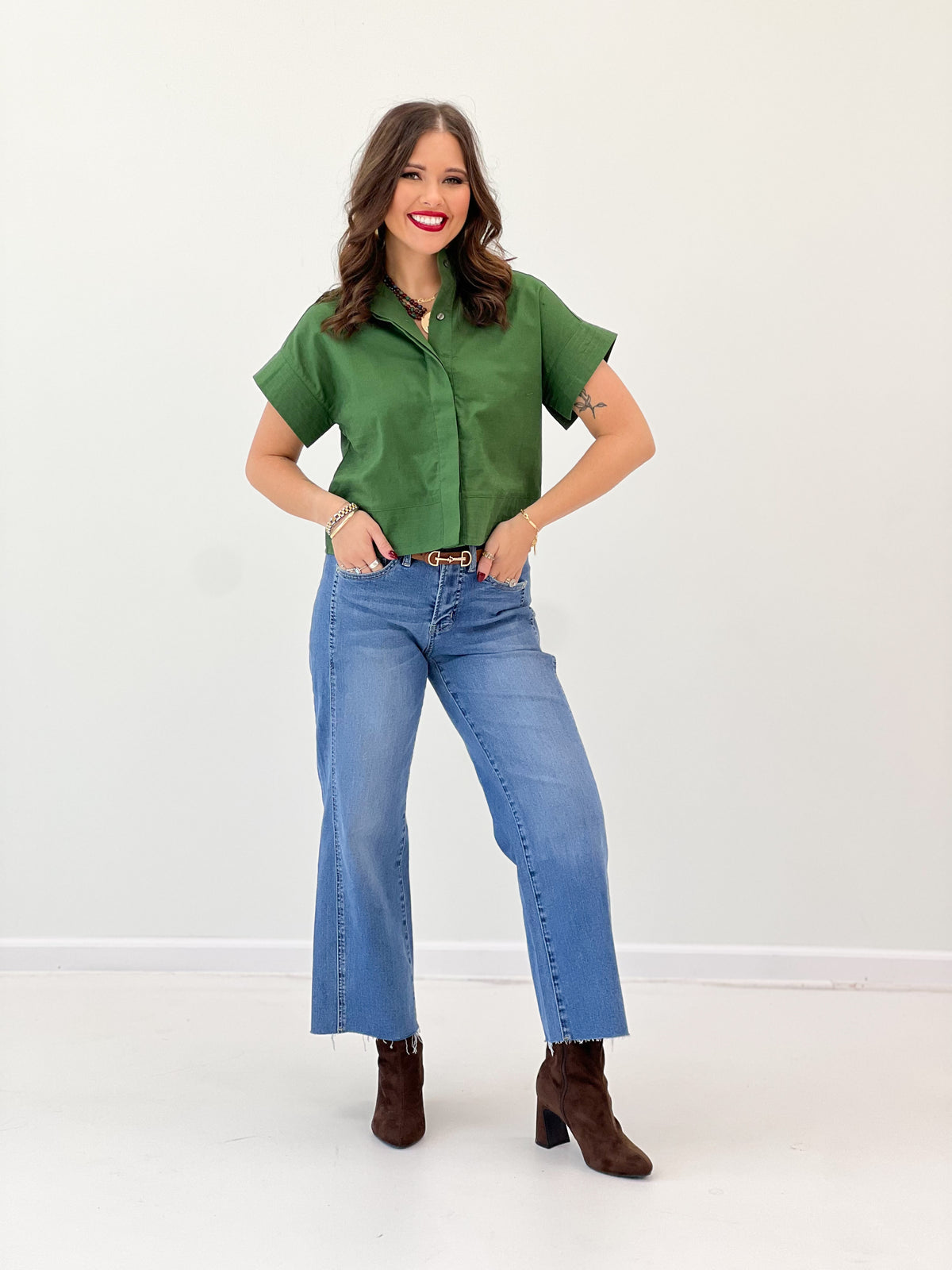 Green solid high-collar short-sleeve button-up top with relaxed fit