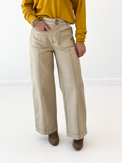 Entro bone pants, light tan with front button-and-zip fly and dual front pockets