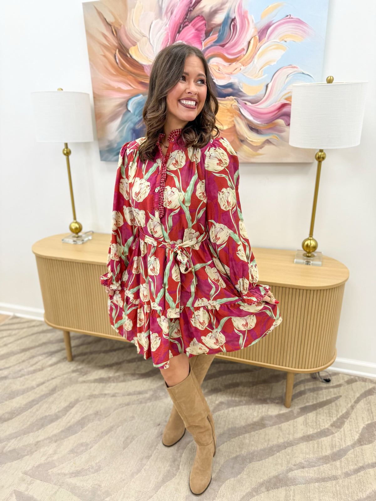 Crimson floral belted tiered mini dress with long sleeves and ruffle hem
