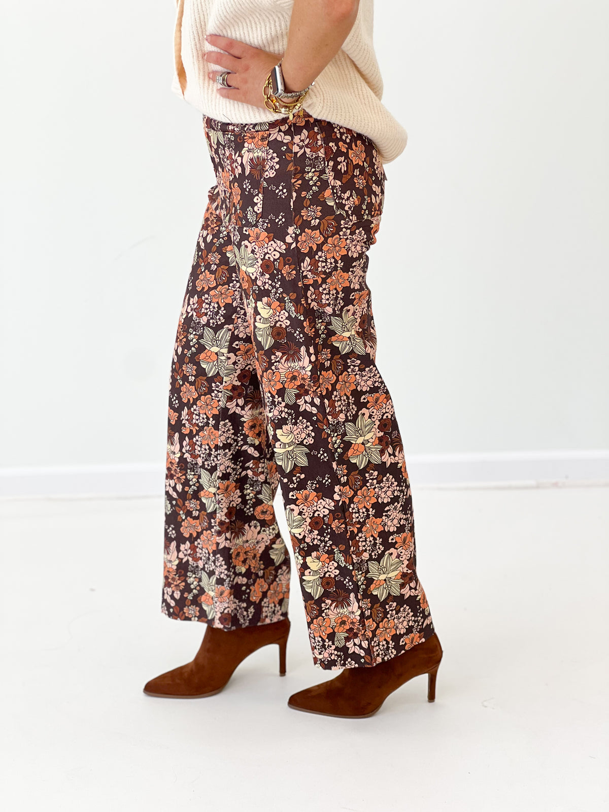 Brown multi floral wide-leg pants with front seam and roomy ankle length