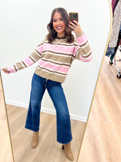 Striped button-front cardigan with long sleeves and crew neckline in cream and pink